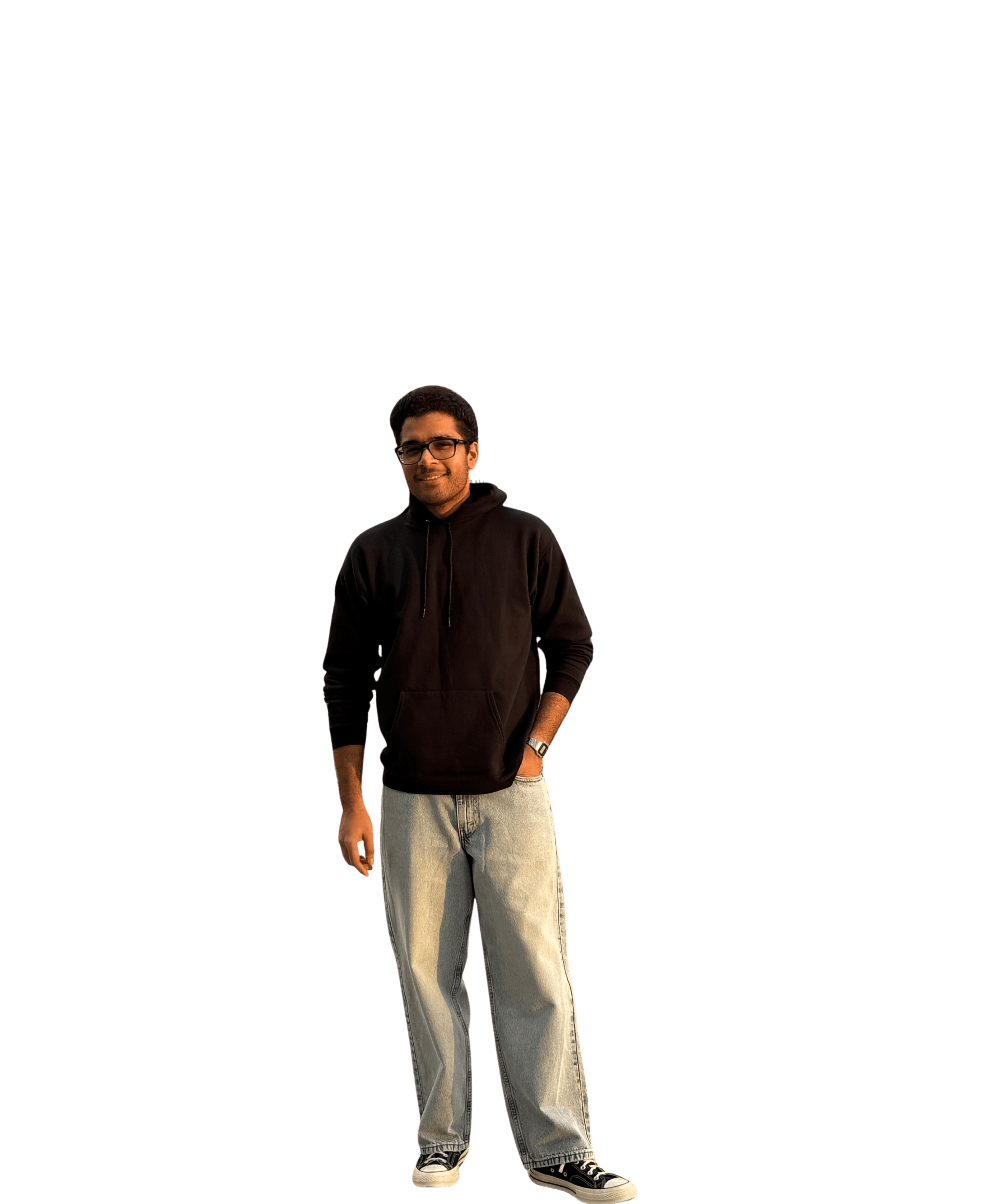Vinay Chanamallu, standing, in a dark hoodie and light jeans